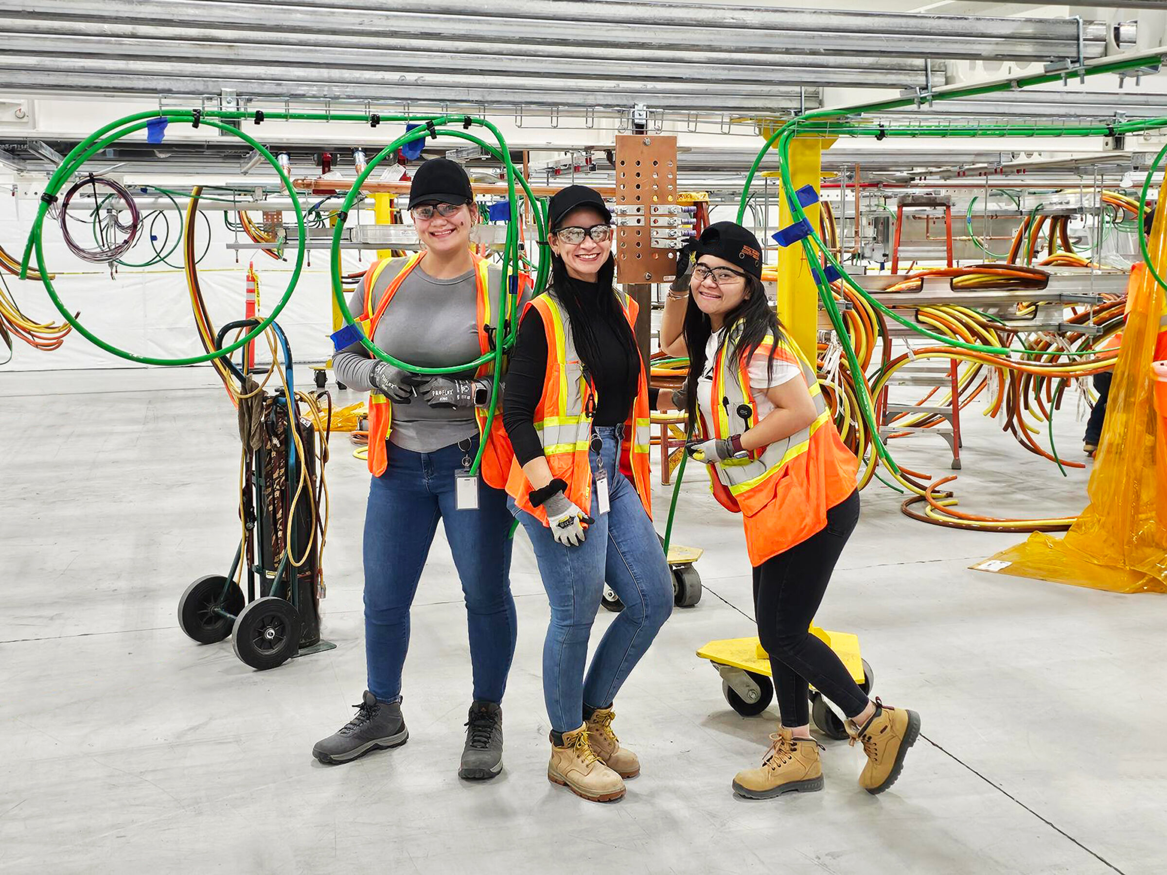 female electricians smiling